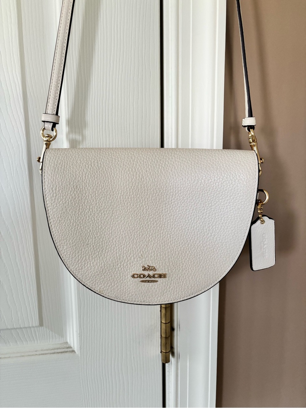 Coach Pebbled Leather Saddle Crossbody in Light Cream with Gold Hardware